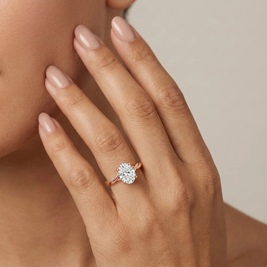 Oval Cut Twist Solitaire Engagement Ring