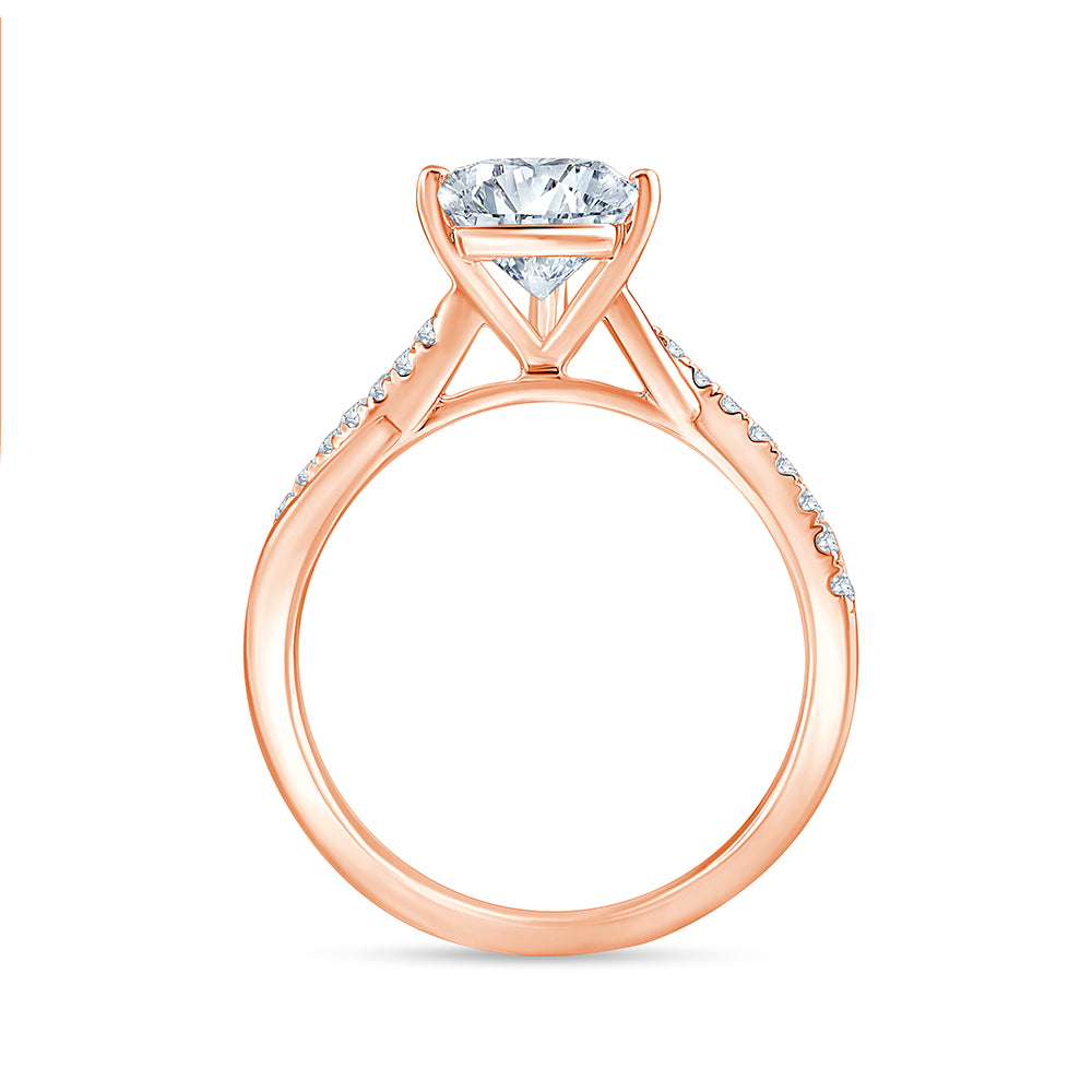 Pear Cut Diamond Accent Twist Solitaire Engagement Ring