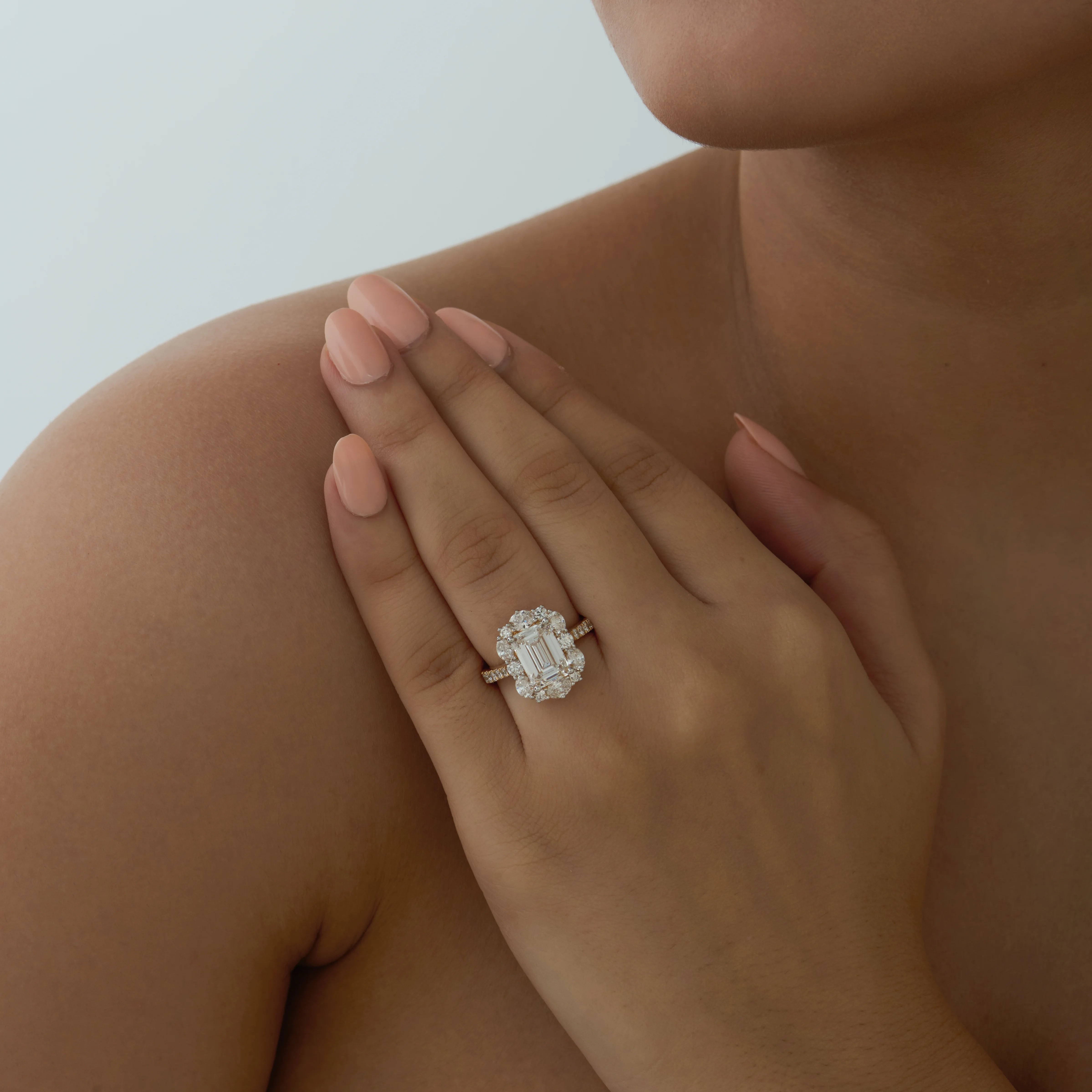 46 Carat Emerald Cut Mixed Halo Engagement Ring