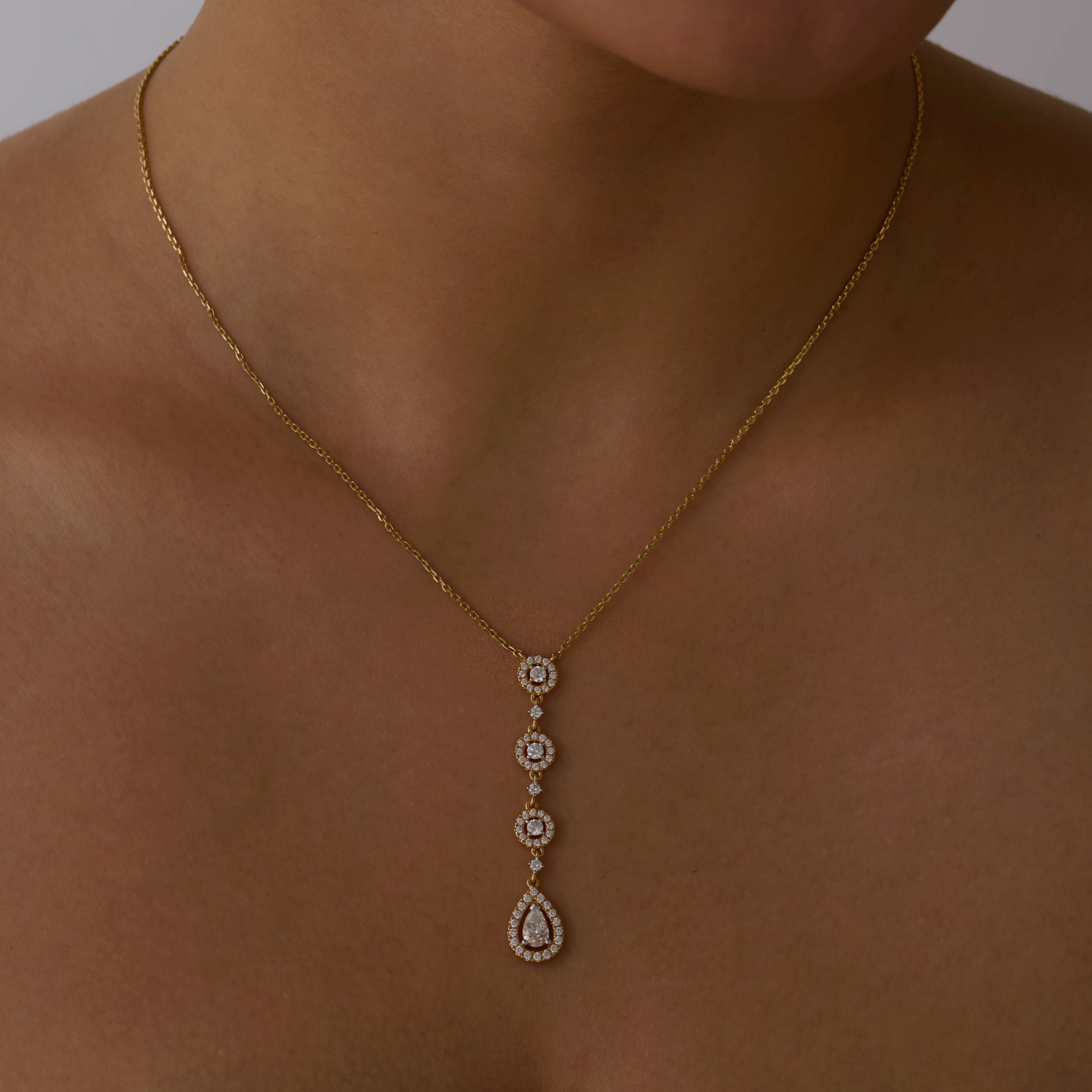 Brilliant and Pear Cut Halo Drop Pendant