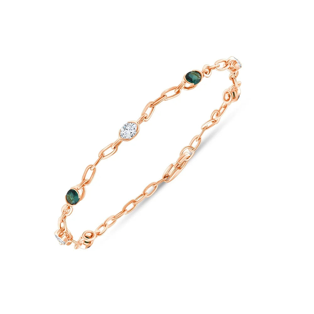 Oval Cut Diamond and Semi-Precious Emerald Station Bracelet