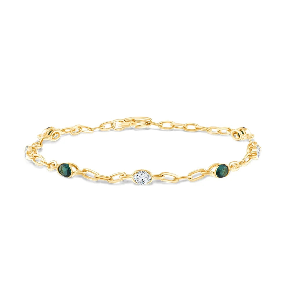 Oval Cut Diamond and SemiPrecious Emerald Station Bracelet