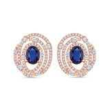 Oval Cut Blue Stone Spiral Halo Stud Earrings