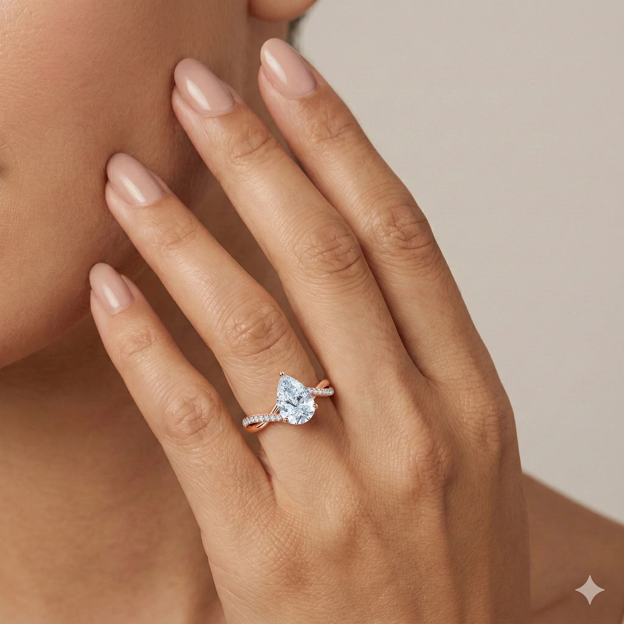 Pear Cut Diamond Accent Twist Solitaire Engagement Ring