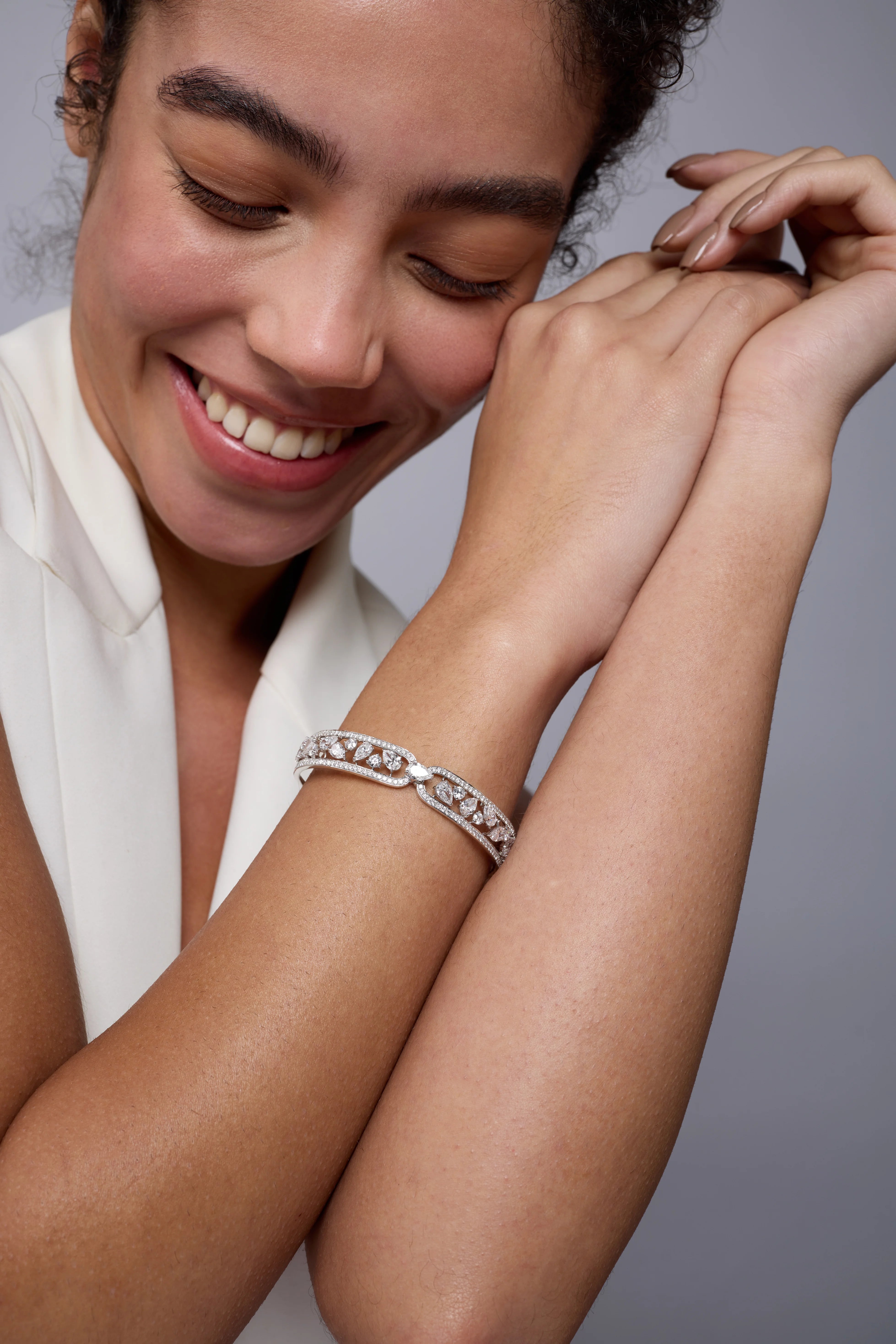 Pear and Brilliant Cut Halo Oval Bracelet